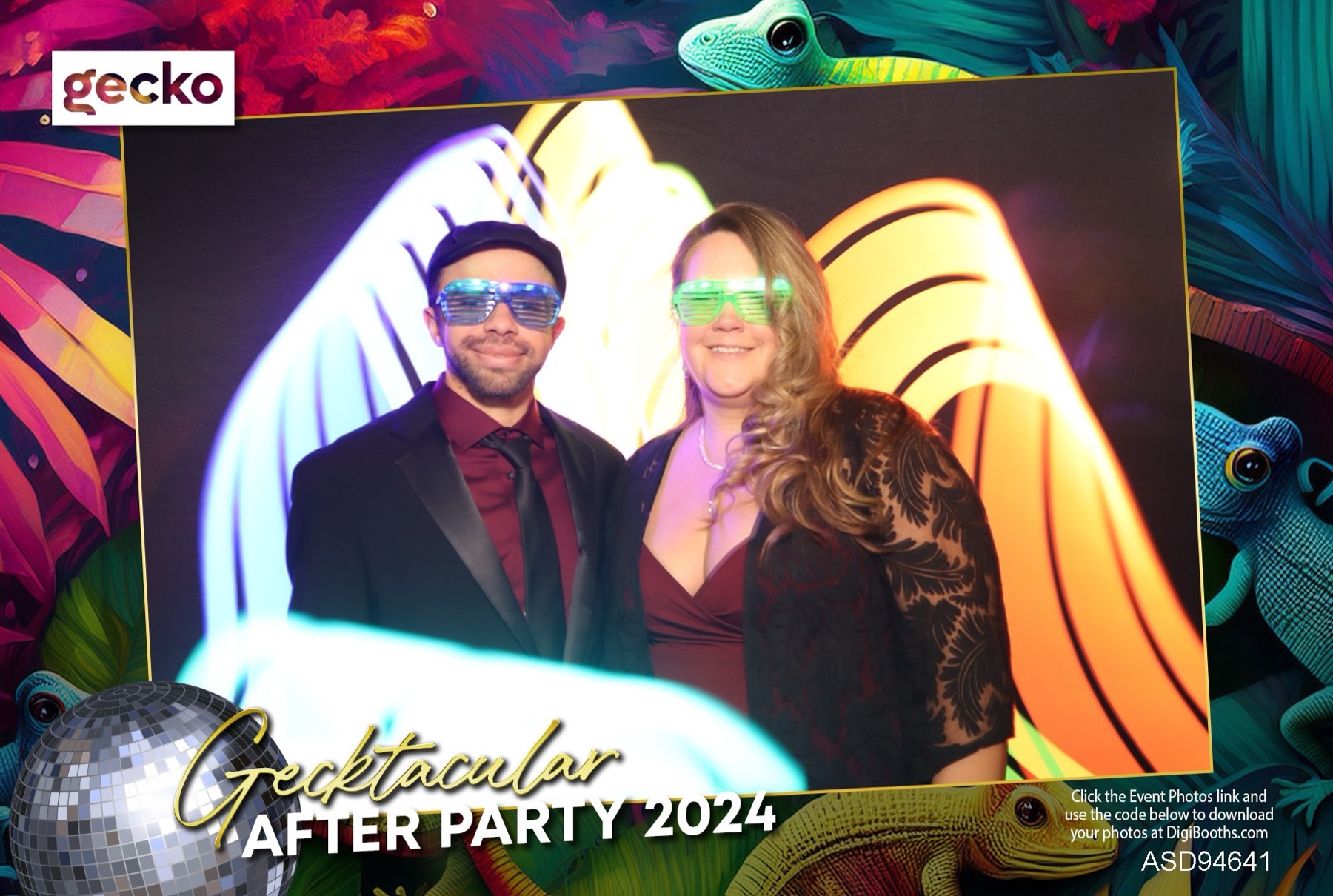 Light-painting booth portrait — guests in glowing LED glasses framed by orange and blue painted light