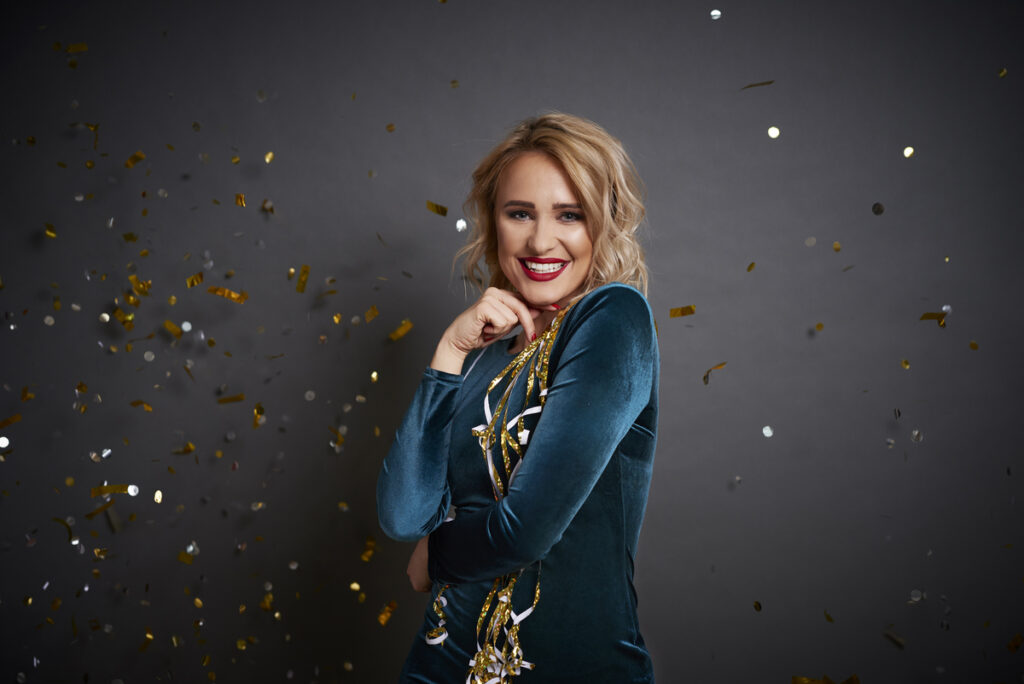 A woman posing for a photo using a slow-motion photo booth.