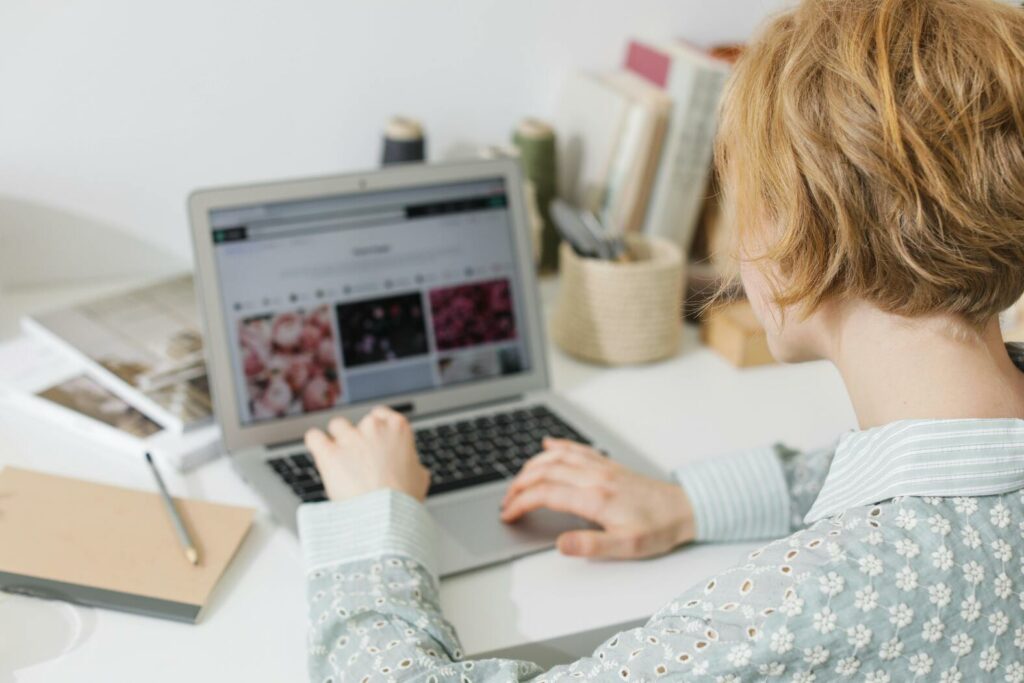 A person is checking the storage of photo booth images