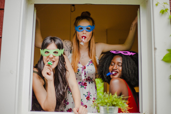 ladies wearing the props for a photoshoot