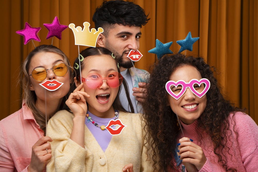 Group of friends with photo booth props