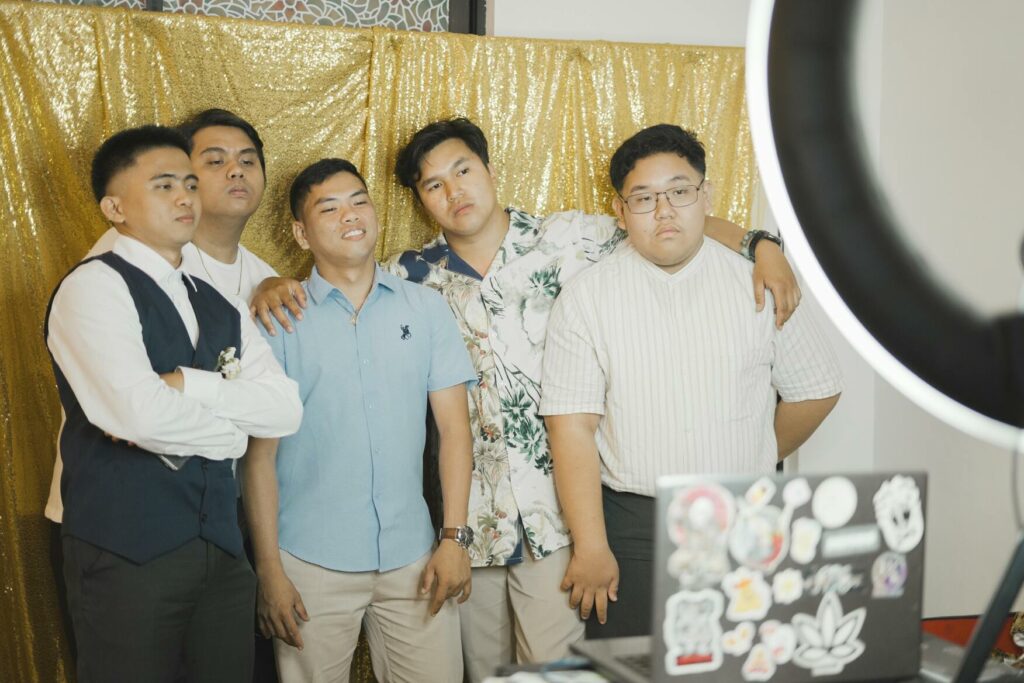 Group of friends posing for a photo booth