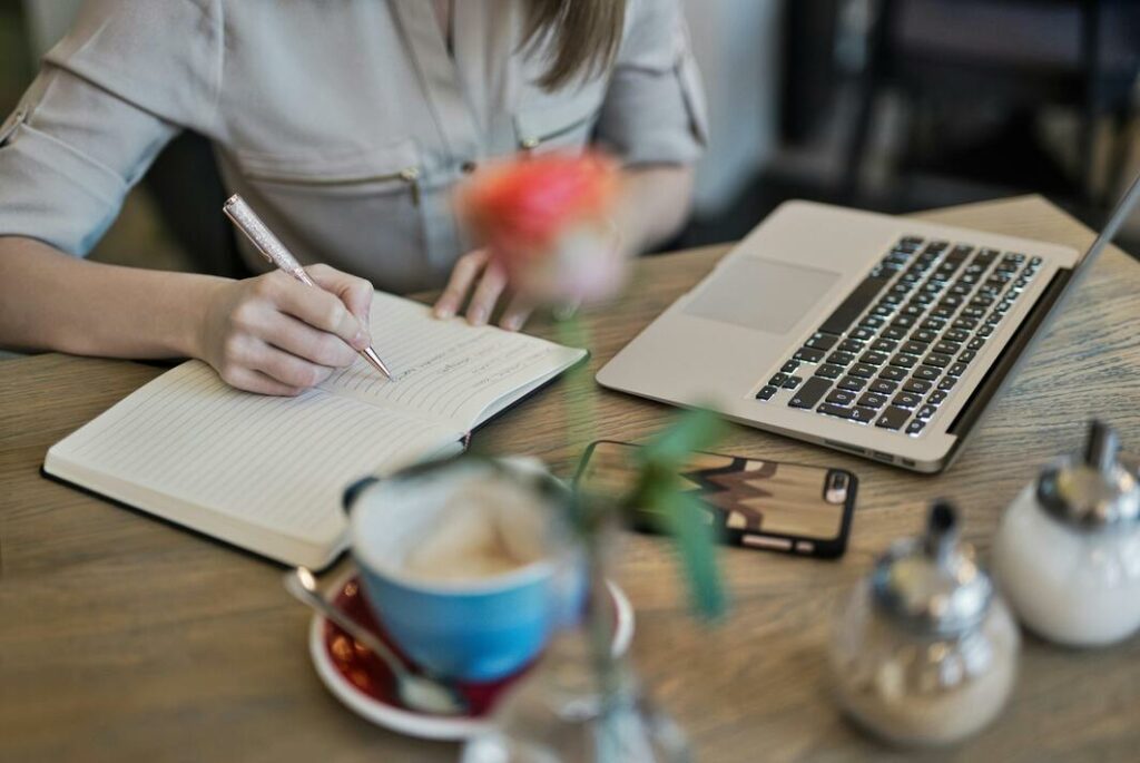 A woman taking down notes