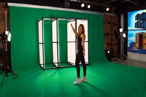 A green screen used as a digital backdrop for a photo booth