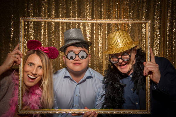 Co-workers enjoying Photo Booth