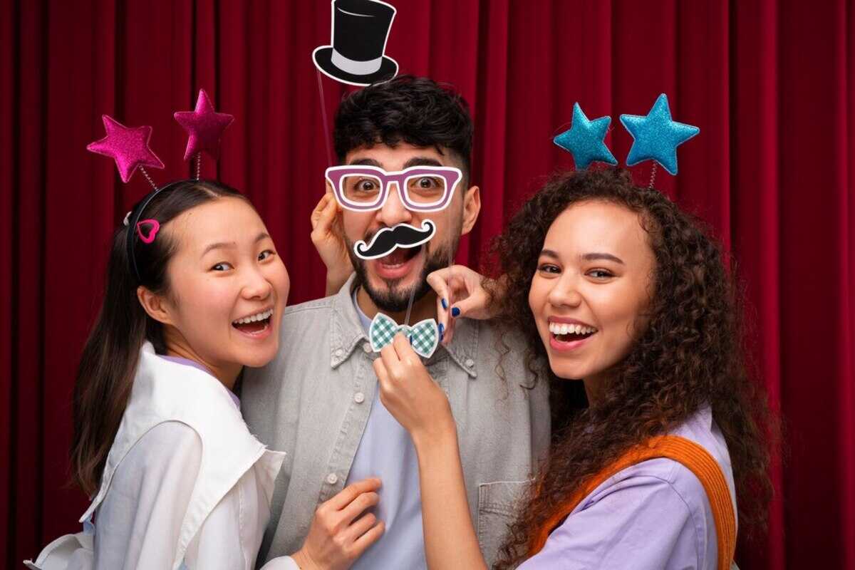 Friends posing in a photo booth