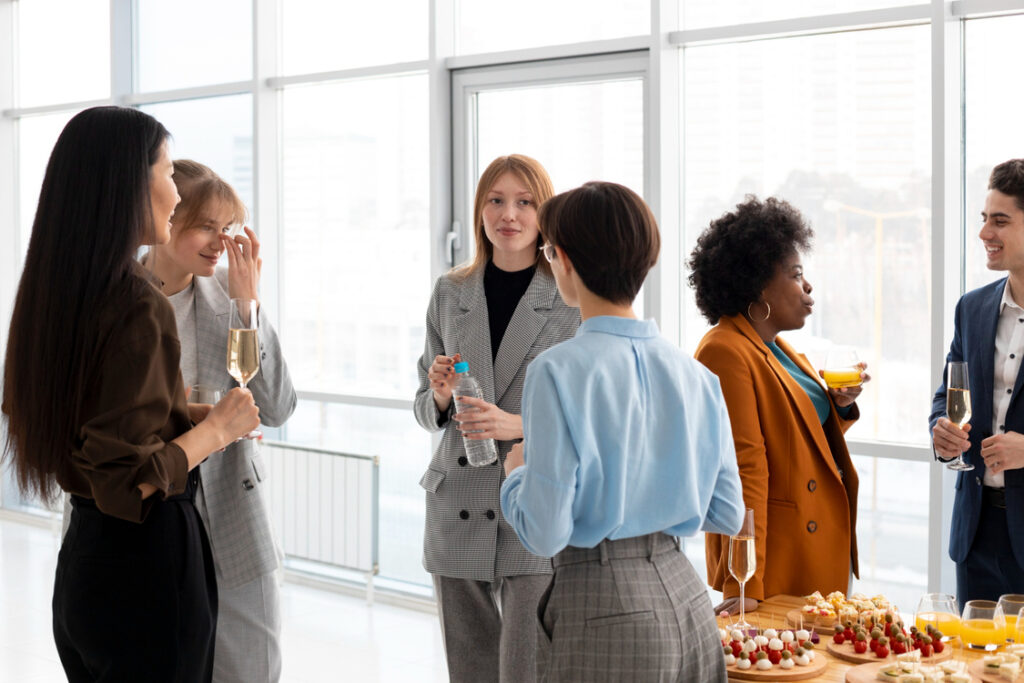 People interacting at the corporate event.