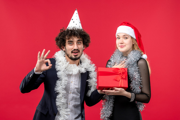 Colleagues having fun in a photobooth