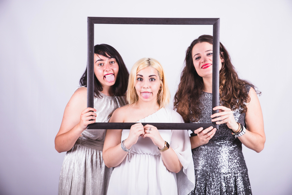 Three ladies enjoying Selfie Photo Booth