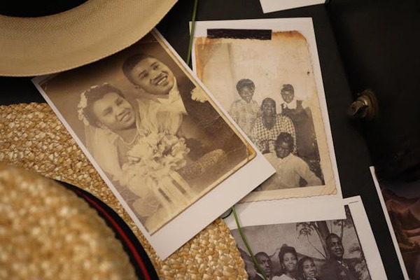 old photographs and a straw hat