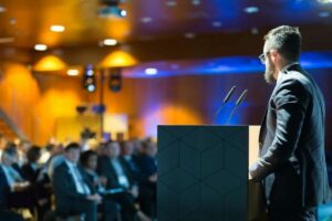 A public speaker in a corporate event