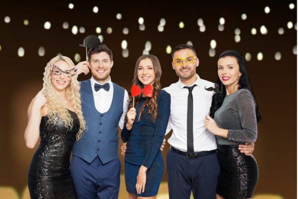 Students experiencing the photo booth during their prom event