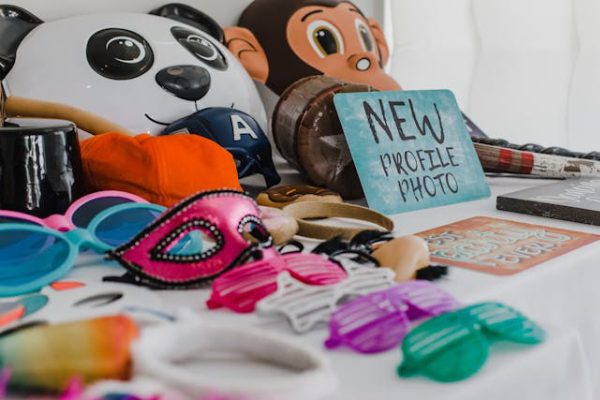 colorful photo booth props on a table ready for a lively reunion celebration